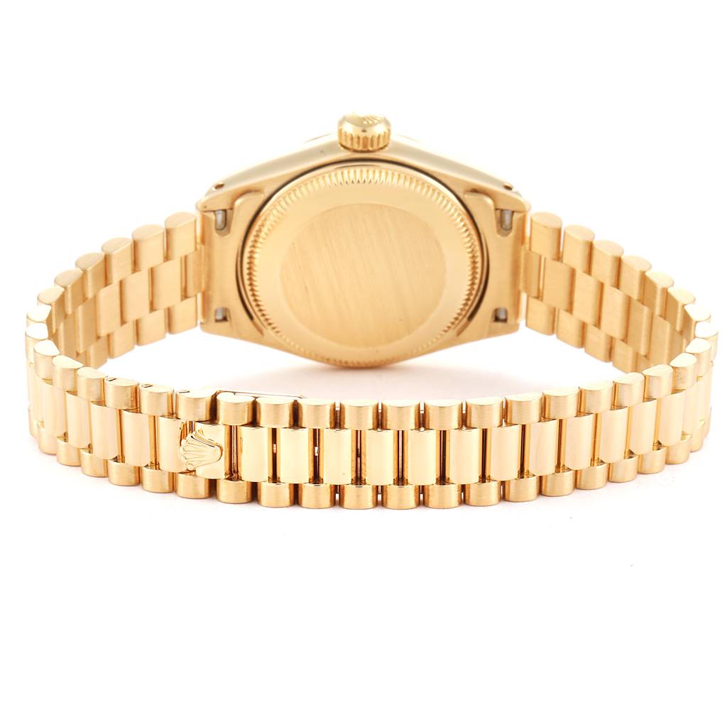 This image shows the back case and bracelet of a Rolex President 6917 Women
s Yellow Gold Champagne Dial 6917 Women
s Yellow Gold Champagne Dial model watch from a rear angle.