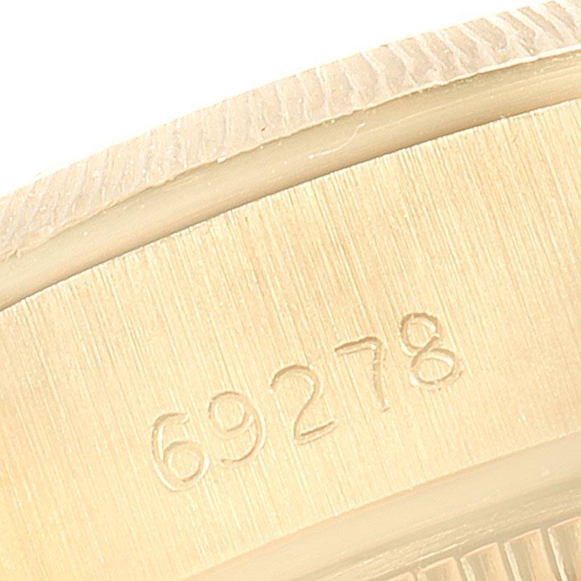 The image shows a close-up of the case side and bezel with the model number "69278" engraved on the Rolex President 69278 Women's Yellow Gold Blue Dial 69278 Women's Yellow Gold Blue Dial watch.