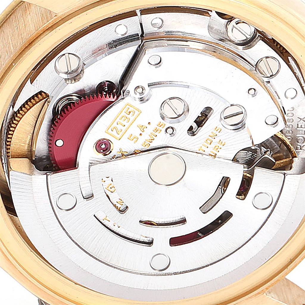 This image shows an internal view of the Rolex President 69278 Women's Yellow Gold Blue Dial 69278 Women's Yellow Gold Blue Dial model's movement mechanism.