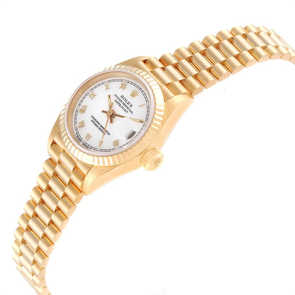 The image shows the Rolex President 69178 Women
s Yellow Gold White Dial 69178 Women
s Yellow Gold White Dial watch at an angled side view, highlighting its gold bracelet, crown, and fluted bezel.