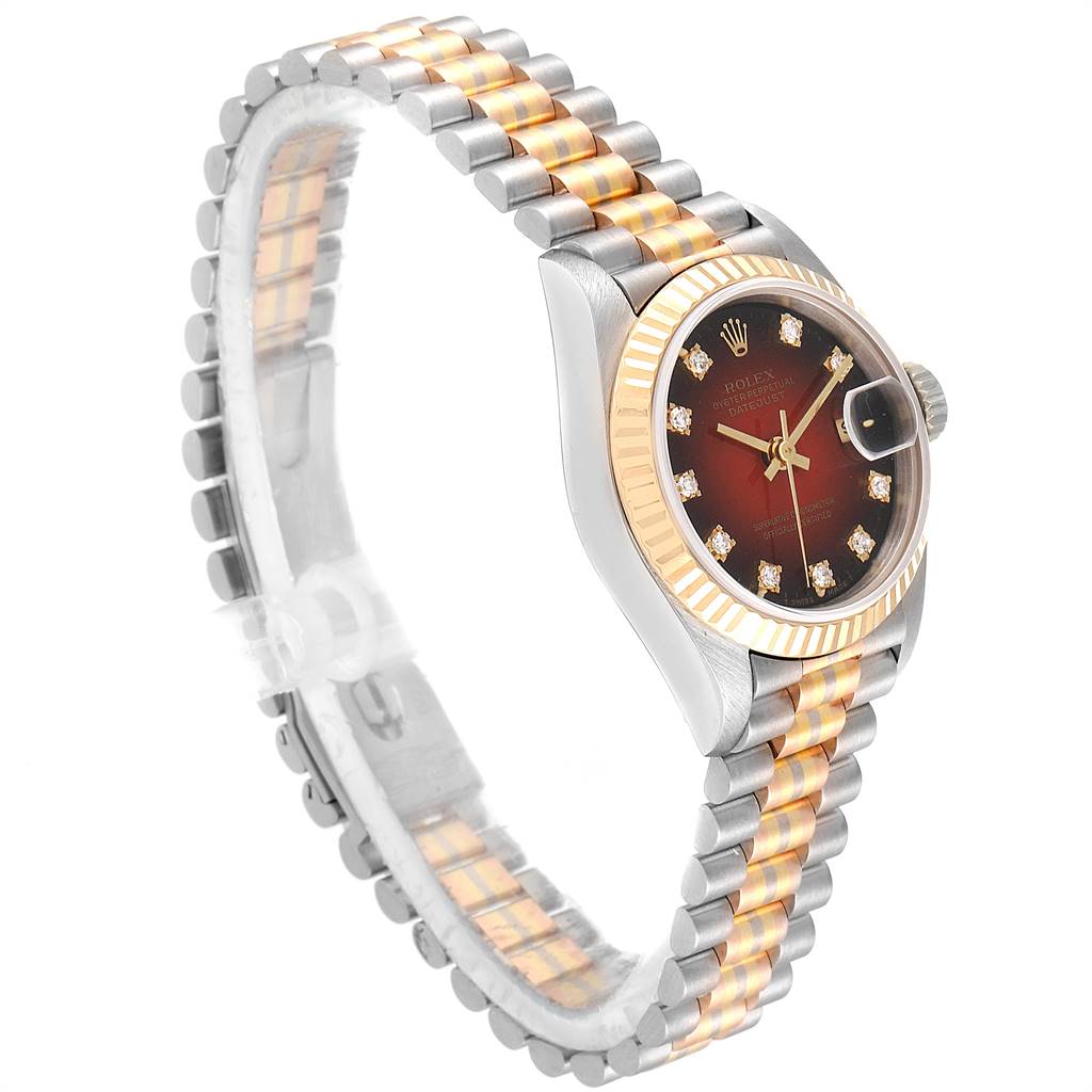 The image shows a Rolex President 69179 Women's White Gold Red Dial 69179 Women's White Gold Red Dial model watch at a three-quarter angle, highlighting the face, bezel, and two-tone bracelet.