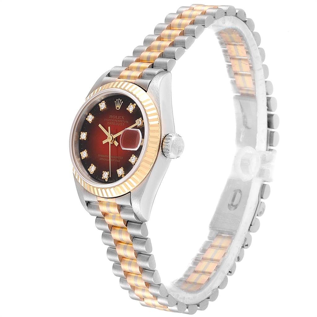 The Rolex President 69179 Women's White Gold Red Dial 69179 Women's White Gold Red Dial model watch is shown at a side angle, detailing its two-tone bracelet, fluted bezel, and diamond-accented dial.
