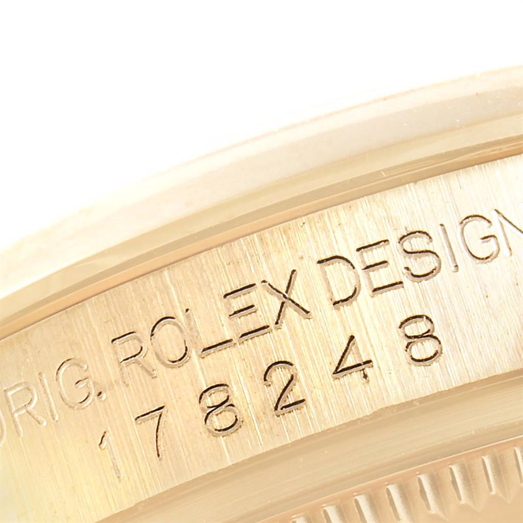 This image shows a close-up of the case markings on a Rolex President 178248 Women
s Yellow Gold Champagne Dial 178248 Women
s Yellow Gold Champagne Dial model watch.