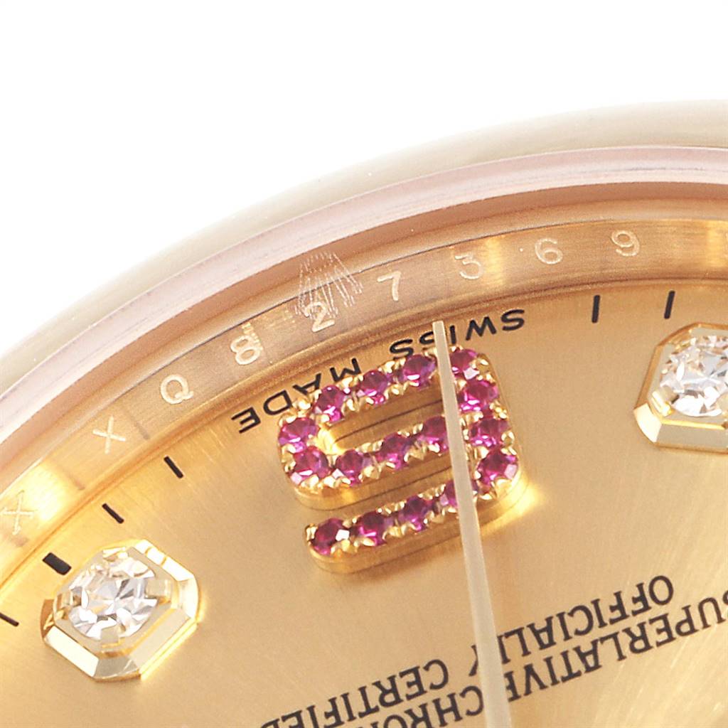 This close-up angle of the Rolex President 178248 Women
s Yellow Gold Champagne Dial 178248 Women
s Yellow Gold Champagne Dial watch shows part of the dial with gem-set hour markers and the Rolex logo.