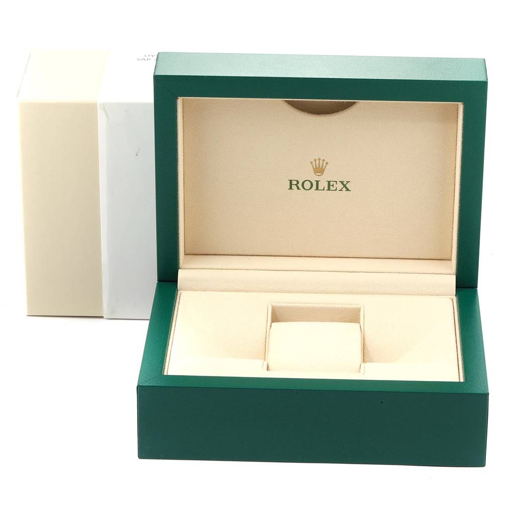The image shows an open green Rolex President 178248 Women
s Yellow Gold Champagne Dial 178248 Women
s Yellow Gold Champagne Dial model watch box with beige interior.