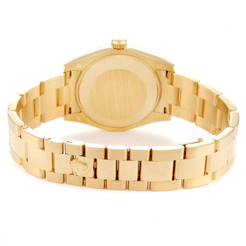 This image shows the back view of a Rolex President 178248 Women
s Yellow Gold Champagne Dial 178248 Women
s Yellow Gold Champagne Dial model watch, highlighting the bracelet and case back.
