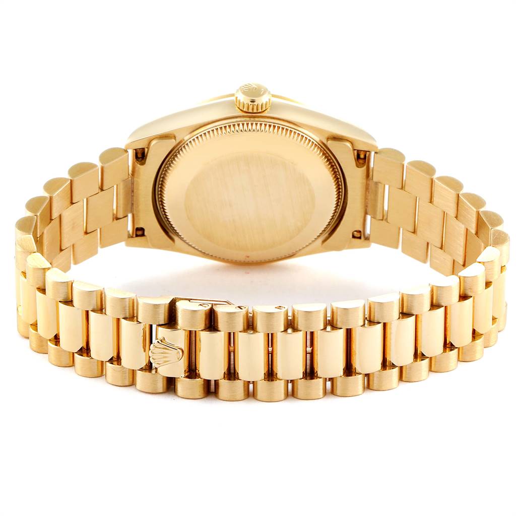 This image displays the back case and bracelet of a Rolex President 68278 Women
s Yellow Gold Champagne Dial 68278 Women
s Yellow Gold Champagne Dial model watch from a rear angle.