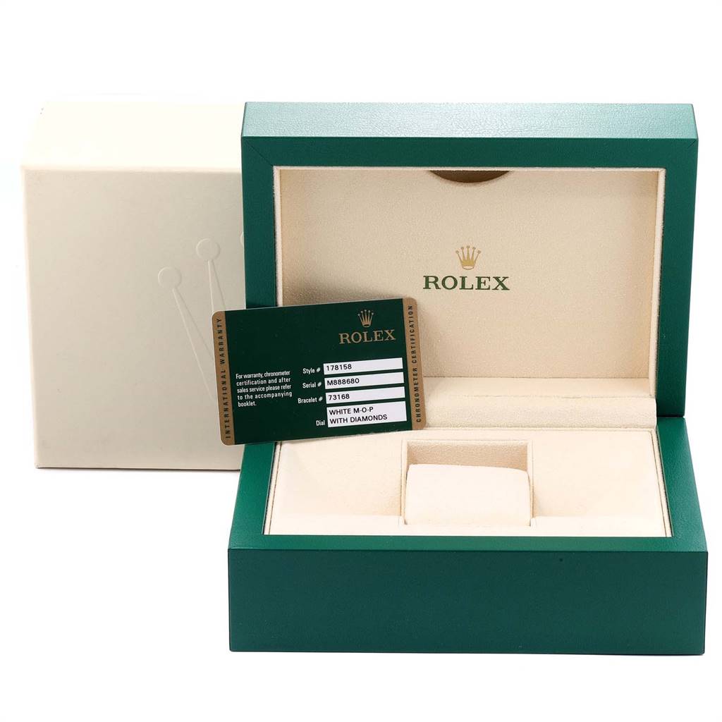 The image shows an open Rolex President 178158 Women
s Yellow Gold Mother of Pearl Dial 178158 Women
s Yellow Gold Mother of Pearl Dial watch box and a certification card displaying style, serial, and bracelet details.