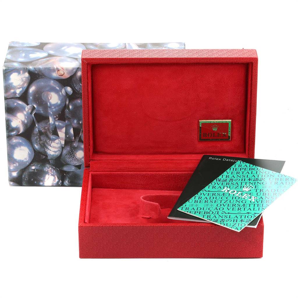 The image shows a red Rolex President 79136 Women's Platinum Mother of Pearl Dial 79136 Women's Platinum Mother of Pearl Dial model watch box with booklets, viewed from the front.
