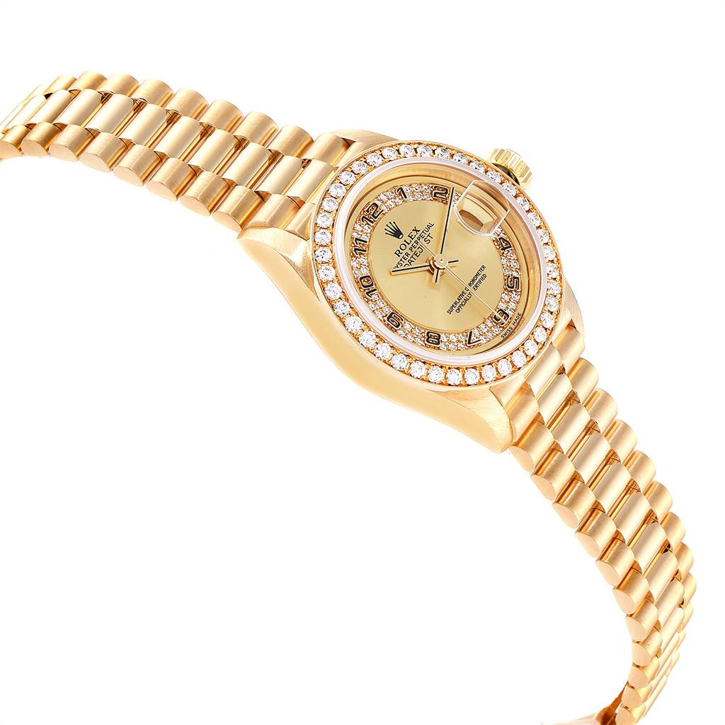 The Rolex President 69178 Women
s Yellow Gold Champagne Dial 69178 Women
s Yellow Gold Champagne Dial model watch is shown at an angled side view displaying the face, bezel, and band.