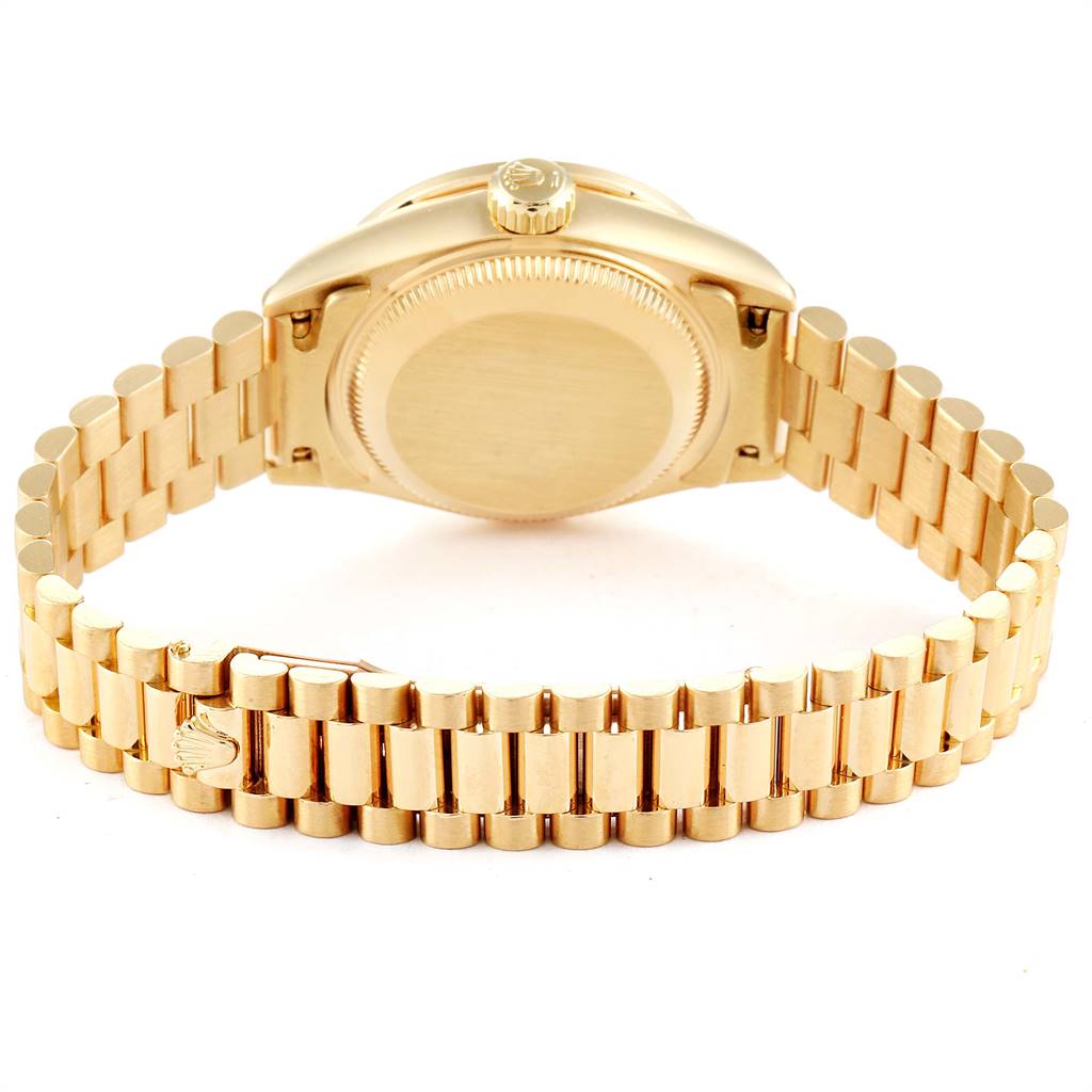 This image shows the back view of a Rolex President 69178 Women
s Yellow Gold Champagne Dial 69178 Women
s Yellow Gold Champagne Dial model watch, highlighting the case back, crown, and bracelet.