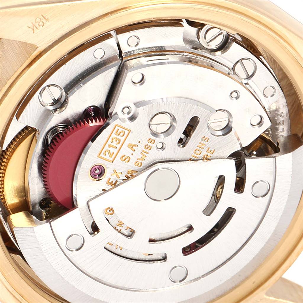 This image shows a close-up view of the inner mechanical movement of a Rolex President 69138 Women
s Yellow Gold White Dial 69138 Women
s Yellow Gold White Dial model watch.