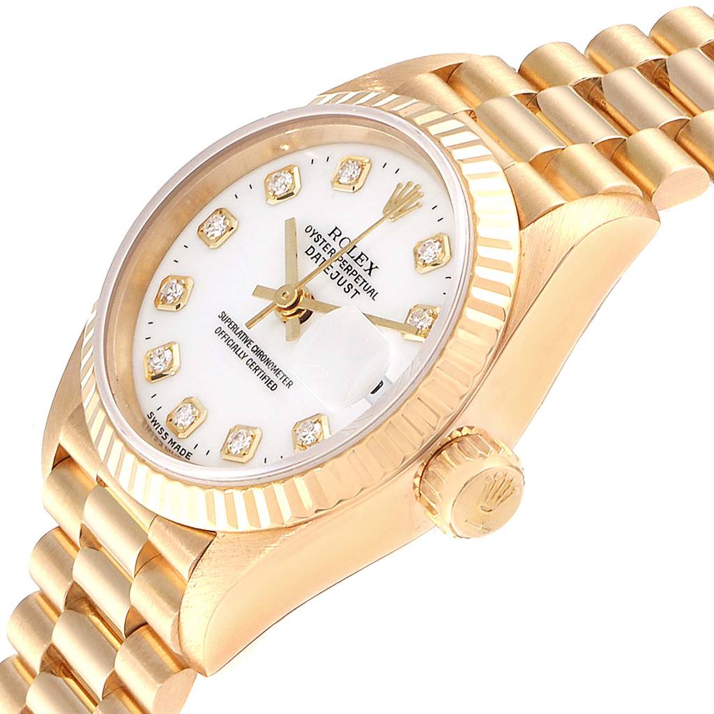 This image shows a Rolex President 69138 Women
s Yellow Gold White Dial 69138 Women
s Yellow Gold White Dial model watch from an angled top view, highlighting the face, bezel, dial, and part of the bracelet.
