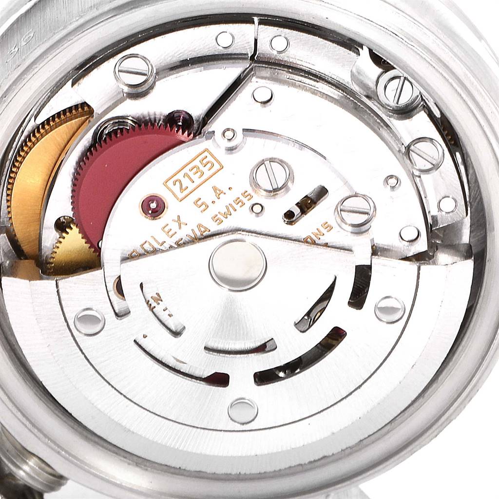 This image shows the internal movement mechanism of a Rolex President 69136 Women's Platinum Silver Dial 69136 Women's Platinum Silver Dial model watch with visible gears and components.