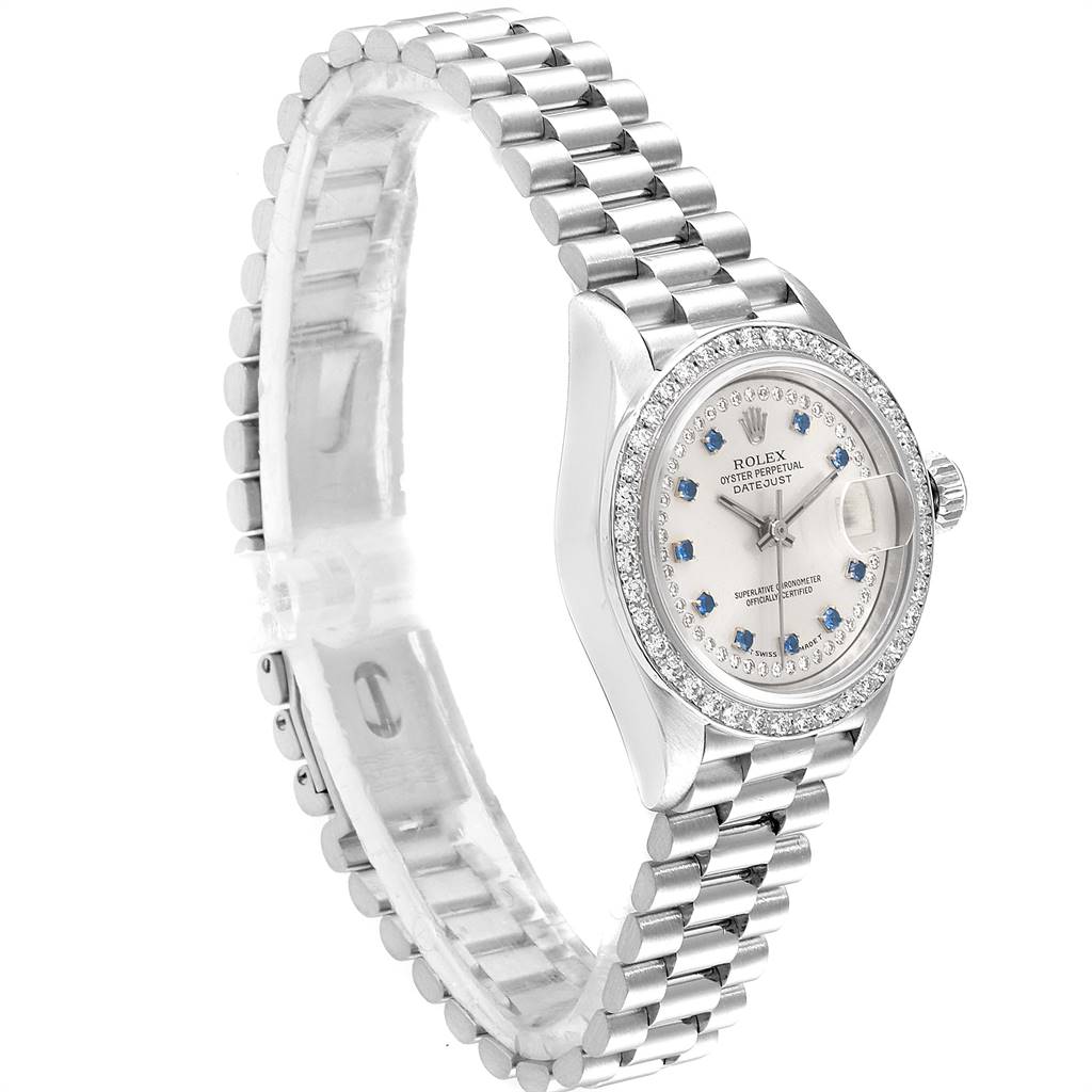 The image shows a side angle of a Rolex President 69136 Women's Platinum Silver Dial 69136 Women's Platinum Silver Dial model watch, displaying its face, bezel, crown, and bracelet.