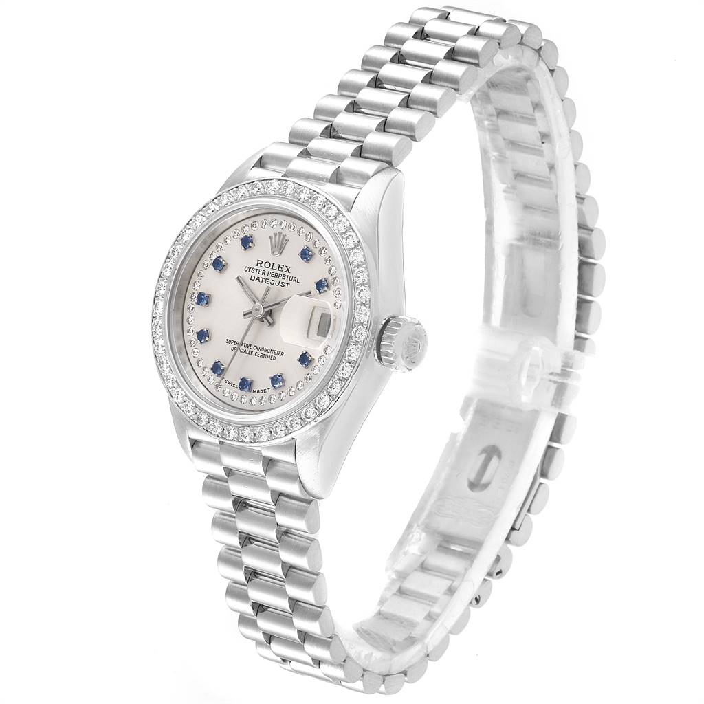 The image shows a Rolex President 69136 Women's Platinum Silver Dial 69136 Women's Platinum Silver Dial model watch at an angle highlighting the face, bezel, crown, and bracelet.