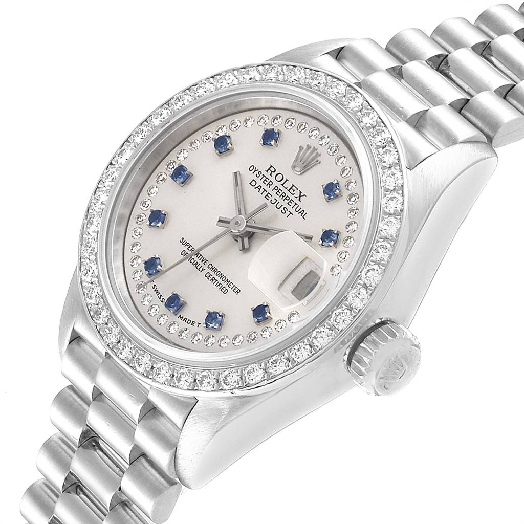 This Rolex President 69136 Women's Platinum Silver Dial 69136 Women's Platinum Silver Dial model watch is shown at an angled view highlighting its face, bezel, and bracelet.