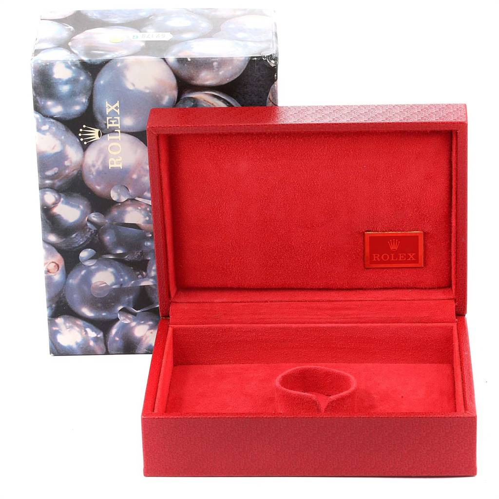 The image shows an open red velvet Rolex watch box for the President model, without the watch inside.