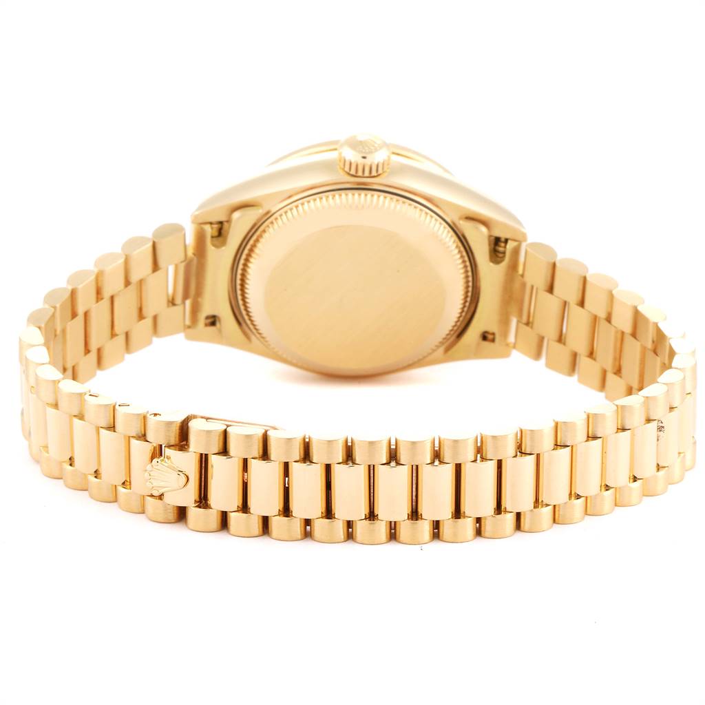 The image shows the back case and bracelet of the Rolex President 79158 Women
s Yellow Gold Champagne Dial 79158 Women
s Yellow Gold Champagne Dial model watch from a rear angle.