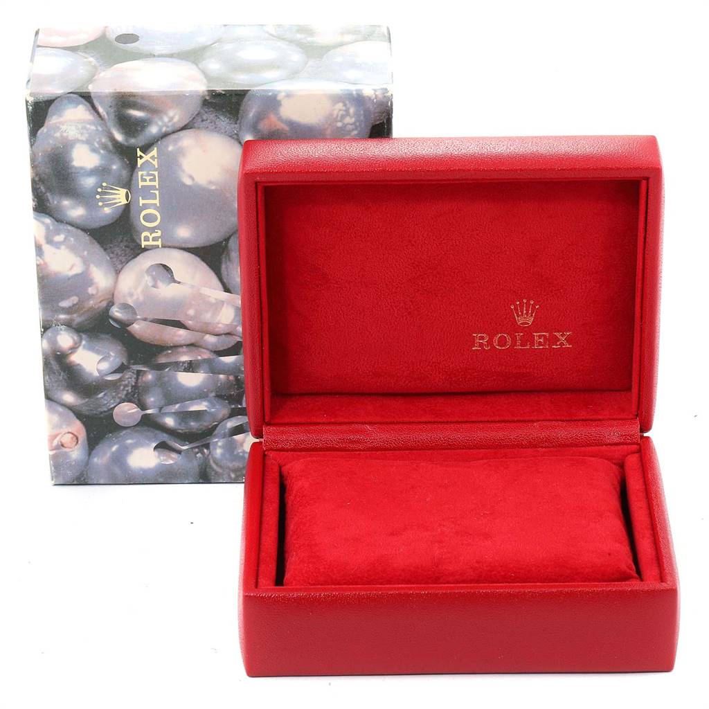 This image shows an open red Rolex President 79178 Women's Yellow Gold Black Dial 79178 Women's Yellow Gold Black Dial model watch box with the brand name inside and its outer box in the background.