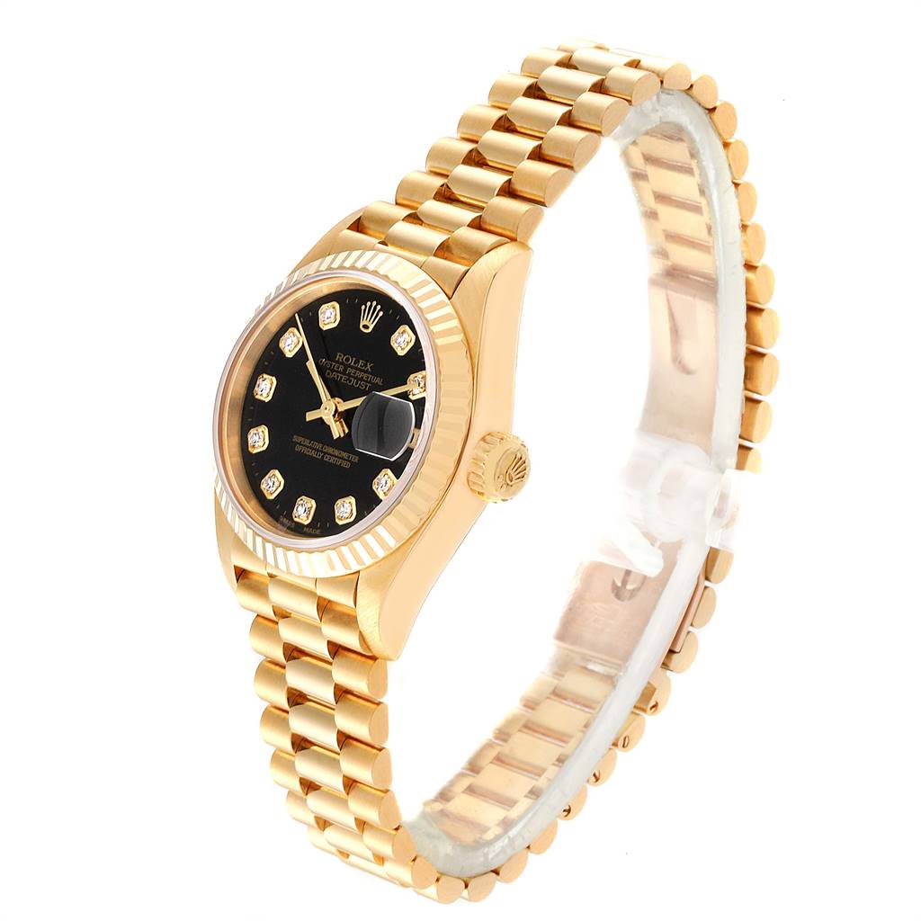 The image shows a Rolex President 79178 Women's Yellow Gold Black Dial 79178 Women's Yellow Gold Black Dial model watch at a slight angle, highlighting the watch face, bracelet, and crown.