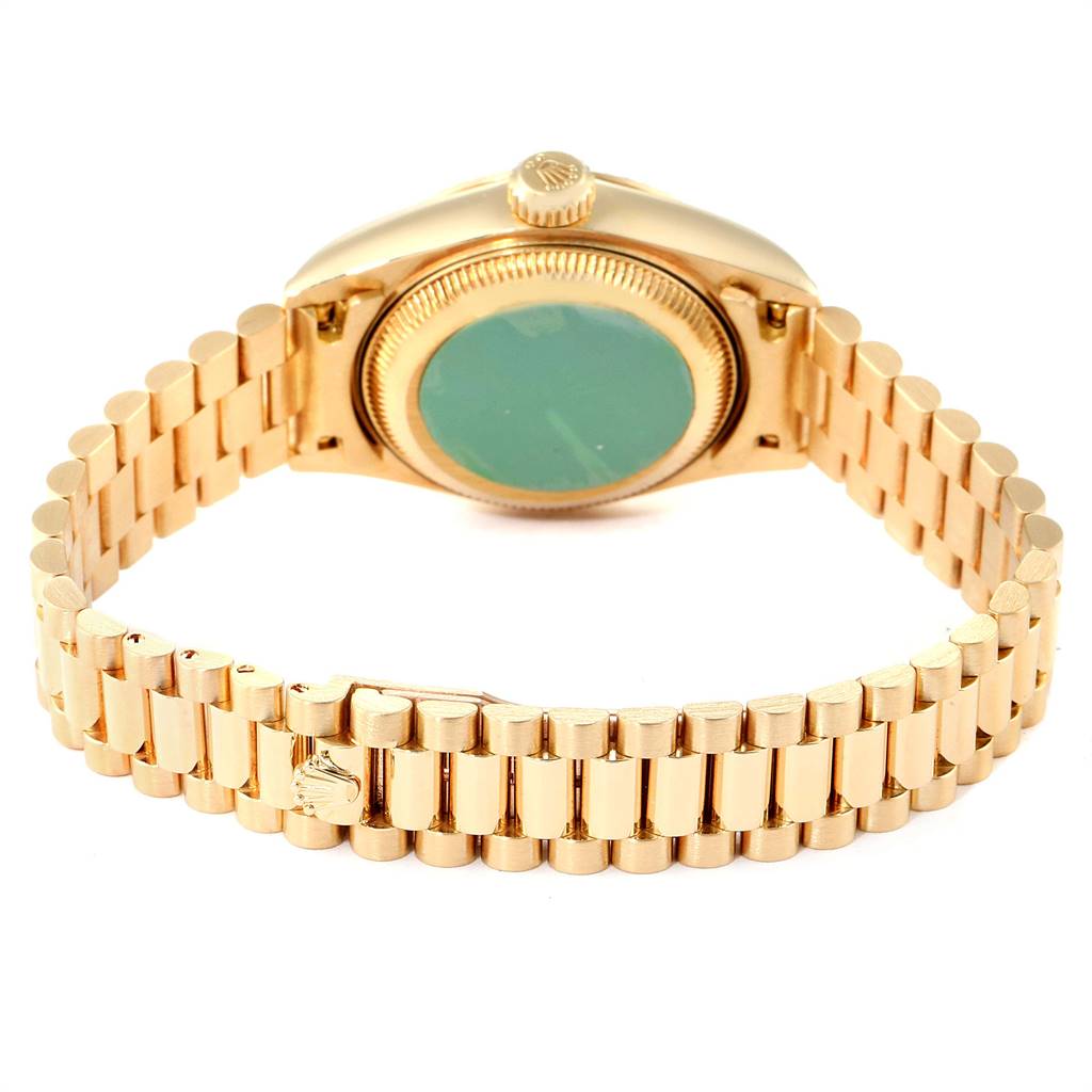 This image shows the back view of a Rolex President 79178 Women's Yellow Gold Black Dial 79178 Women's Yellow Gold Black Dial model watch, highlighting the bracelet and case back.