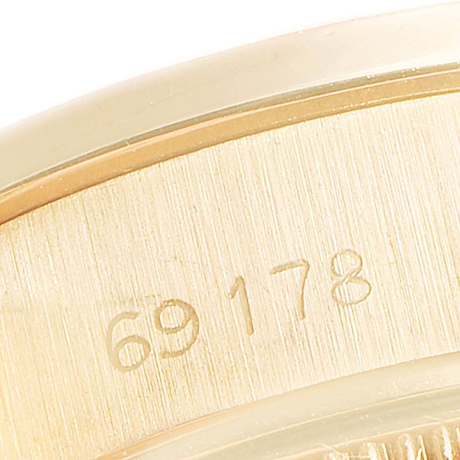 This close-up image shows the caseback detailing and reference number "69178" of the Rolex President 69178 Women's Yellow Gold Beige Dial 69178 Women's Yellow Gold Beige Dial model watch.