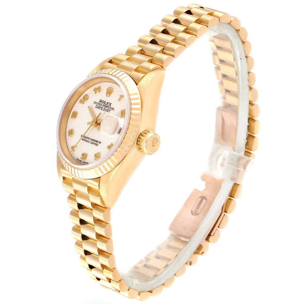 This image shows a side view of a gold Rolex President 69178 Women's Yellow Gold Beige Dial 69178 Women's Yellow Gold Beige Dial model watch, displaying the bracelet, bezel, crown, and watch face.