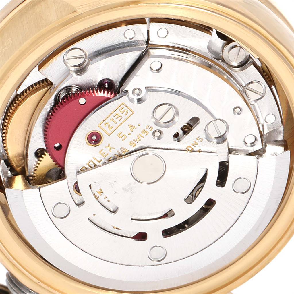 This image shows a close-up view of the Rolex President 69138 Women
s Yellow Gold Champagne Dial 69138 Women
s Yellow Gold Champagne Dial model
s movement mechanism.