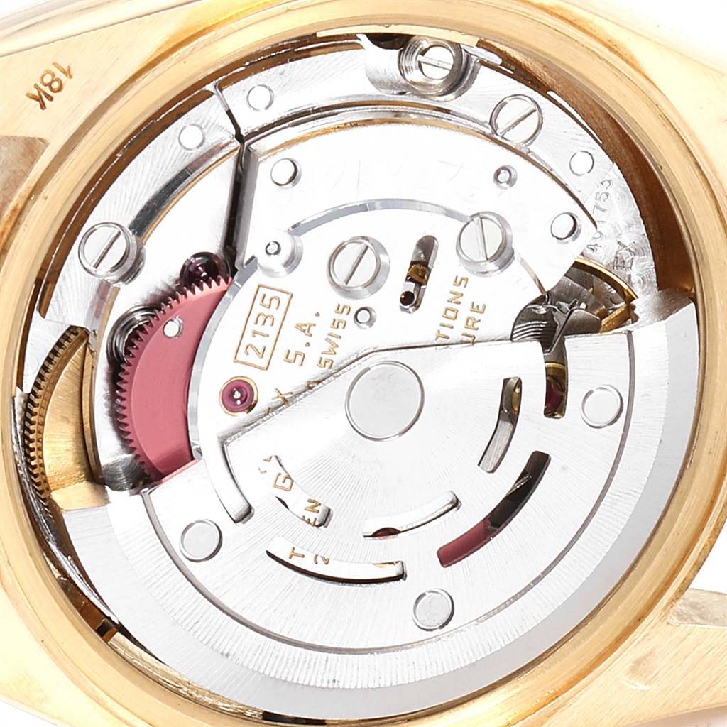 The image shows a close-up view of the internal mechanical movement of a Rolex President 69158 Women's Yellow Gold Silver Dial 69158 Women's Yellow Gold Silver Dial model watch.