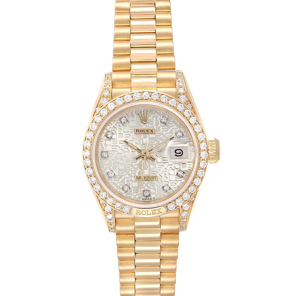 The image shows a front view of a Rolex President 69158 Women's Yellow Gold Silver Dial 69158 Women's Yellow Gold Silver Dial model watch, highlighting its gold bracelet, diamond bezel, and patterned dial with a date display.