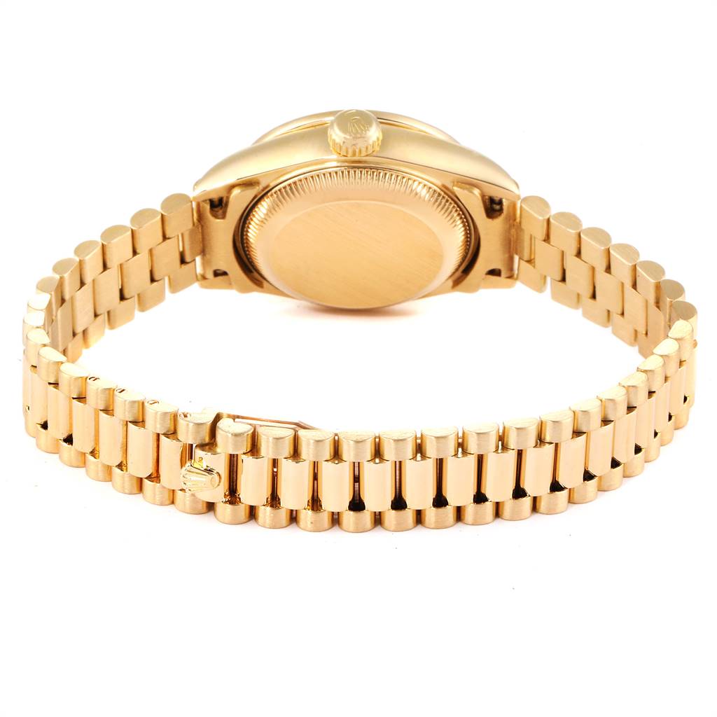 The image shows the back case and bracelet of a Rolex President 69158 Women's Yellow Gold Silver Dial 69158 Women's Yellow Gold Silver Dial model watch from a rear angle.