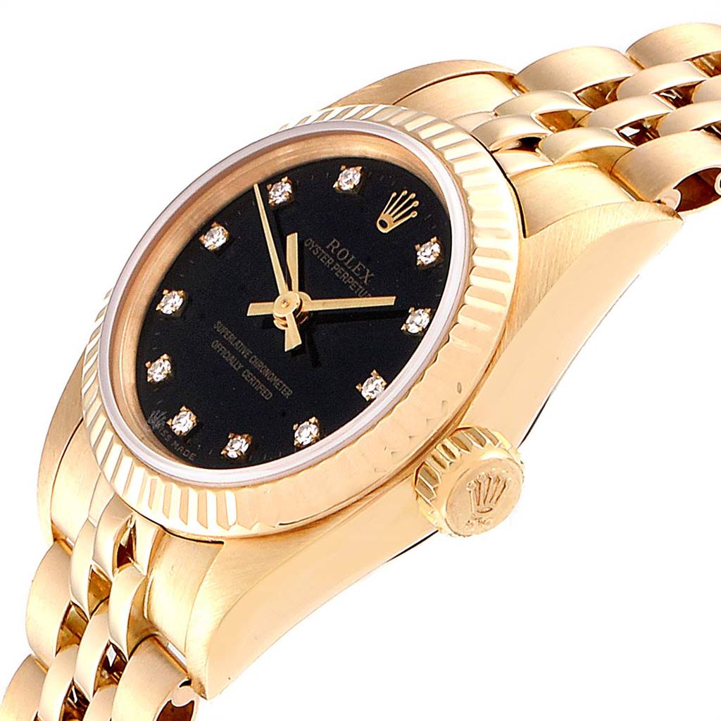 The image shows a Rolex President 67198 Women's Yellow Gold Black Dial 67198 Women's Yellow Gold Black Dial watch at an angle highlighting the gold case, black diamond-studded dial, and crown.