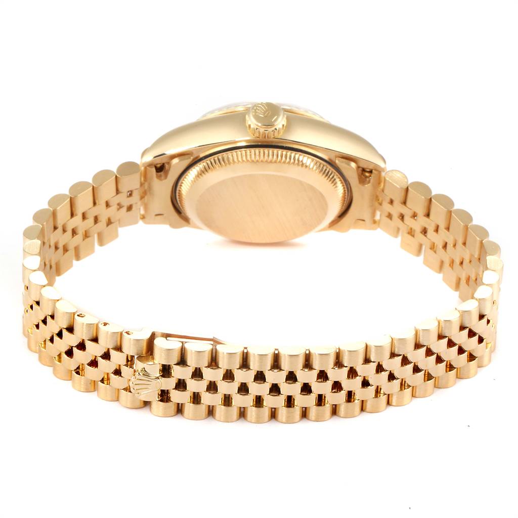 The image shows the back view of a Rolex President 69178 Women
s Yellow Gold Champagne Dial 69178 Women
s Yellow Gold Champagne Dial model watch, highlighting the case back and gold bracelet.