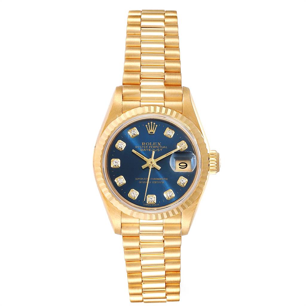 This image shows a President model Rolex watch, featuring a gold bracelet, blue dial, date display, and diamond markers.