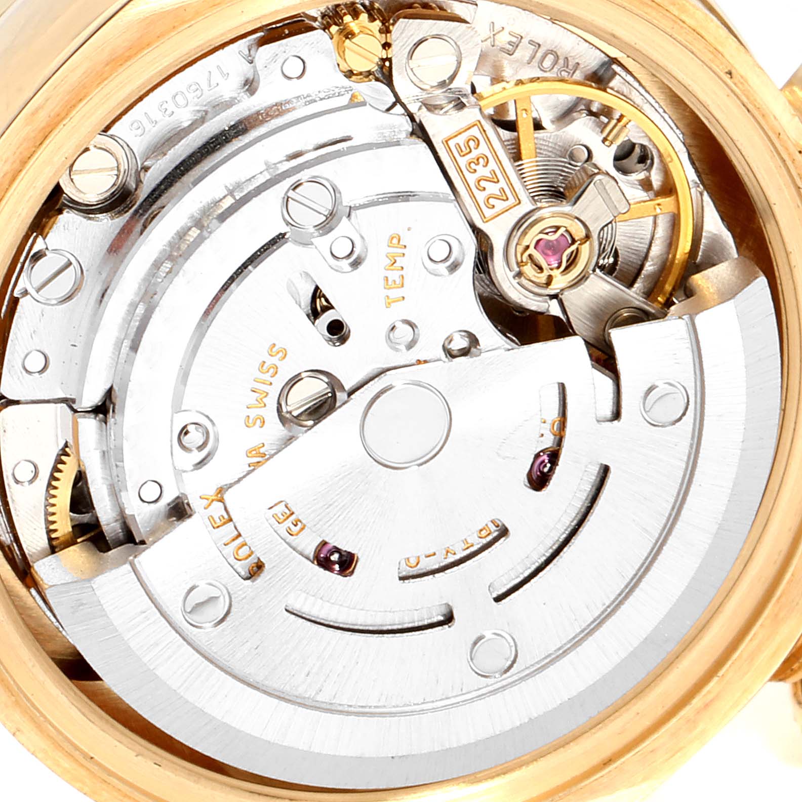 The image shows the internal mechanism of a Rolex President 179178 Women
s Yellow Gold Champagne Dial 179178 Women
s Yellow Gold Champagne Dial model watch from a close-up rear angle.