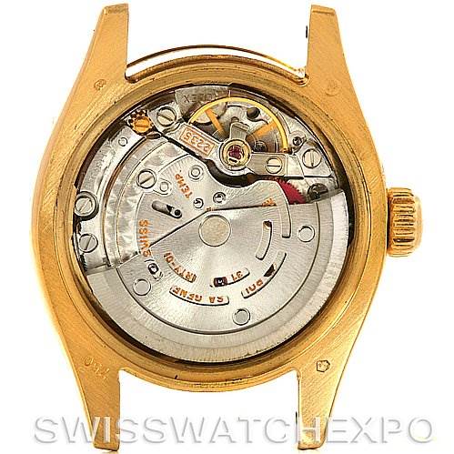 The image shows the internal mechanism of a Rolex President 179178 Women's Yellow Gold White Dial 179178 Women's Yellow Gold White Dial watch from a rear angle.
