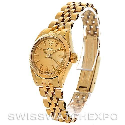This image shows a Rolex President 6719 Women's Yellow Gold Champagne Dial 6719 Women's Yellow Gold Champagne Dial model watch from an oblique angle, highlighting its dial, bezel, and bracelet.