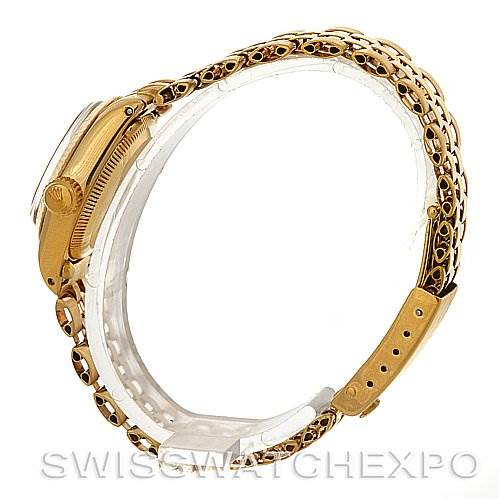 The image shows a side view of a Rolex President 6719 Women's Yellow Gold Champagne Dial 6719 Women's Yellow Gold Champagne Dial model watch, highlighting the case, crown, and partially the bracelet.