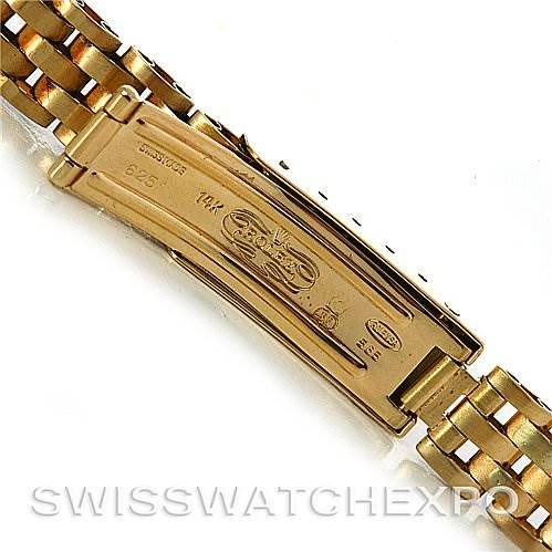 This image shows the underside of the clasp of a Rolex President 6719 Women's Yellow Gold Champagne Dial 6719 Women's Yellow Gold Champagne Dial model watch bracelet.