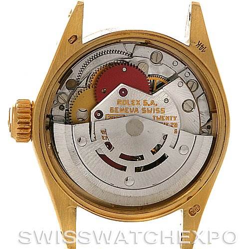 The image shows the inner mechanism and movement of a Rolex President 6719 Women's Yellow Gold Champagne Dial 6719 Women's Yellow Gold Champagne Dial watch from a rear angle.