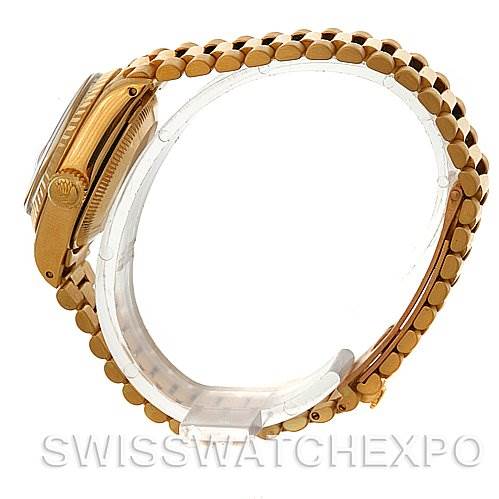 The image shows a side view of the Rolex President 6917 Women's Yellow Gold Black Dial 6917 Women's Yellow Gold Black Dial model watch, focusing on the crown, bezel, and bracelet.