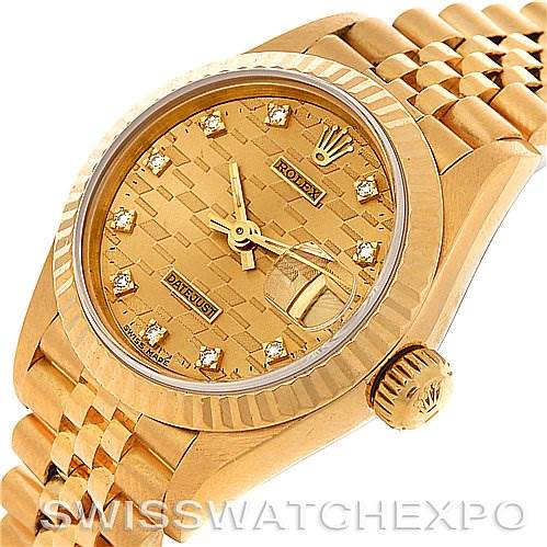 The image shows a close-up, angled view of a Rolex President 69178 Women's Yellow Gold Champagne Dial 69178 Women's Yellow Gold Champagne Dial model watch, highlighting the dial, bezel, and part of the bracelet.