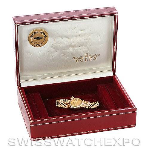The image shows a Rolex President 69178 Women's Yellow Gold Champagne Dial 69178 Women's Yellow Gold Champagne Dial model watch in a red velvet-lined Rolex presentation box, viewed from the top.