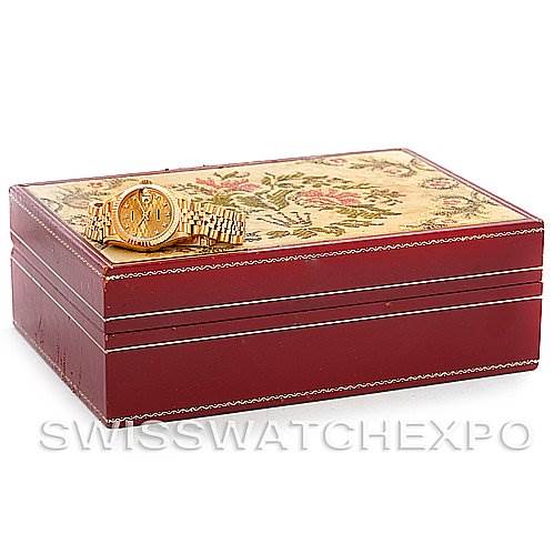 The image shows a Rolex President 69178 Women's Yellow Gold Champagne Dial 69178 Women's Yellow Gold Champagne Dial model watch from a top angle, displayed on a decorative box with floral patterns.