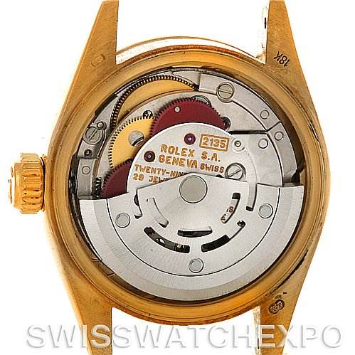 This image shows the back of a Rolex President 69178 Women's Yellow Gold White Dial 69178 Women's Yellow Gold White Dial watch, exposing its internal movement and mechanisms.