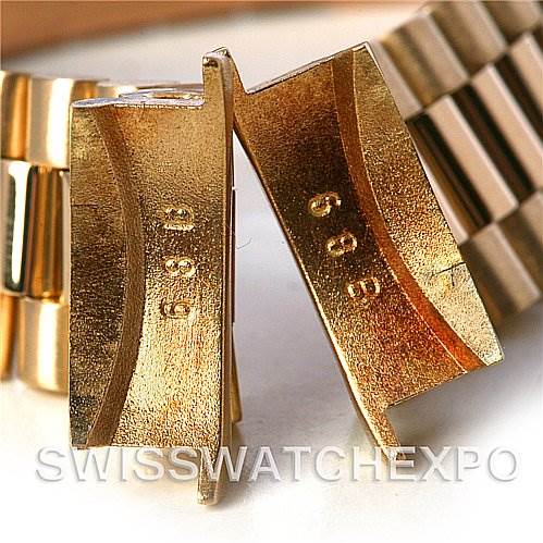 Close-up of the links and end pieces of a Rolex President 69178 Women's Yellow Gold White Dial 69178 Women's Yellow Gold White Dial model watch.