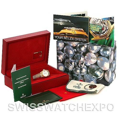 The image shows a Rolex President 69178 Women's Yellow Gold White Dial 69178 Women's Yellow Gold White Dial watch, its box, manuals, and accessories from a top-down angle.