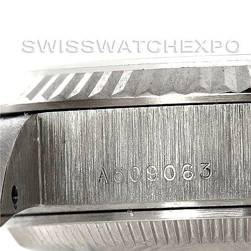 This image shows a close-up side view of the case, bezel, and serial number of a Rolex President 79179 Women's White Gold Pink Dial 79179 Women's White Gold Pink Dial model watch.