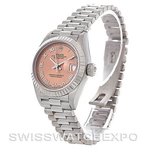 This image shows a Rolex President 79179 Women's White Gold Pink Dial 79179 Women's White Gold Pink Dial model watch at a three-quarter angle, featuring the face, bezel, crown, and part of the bracelet.